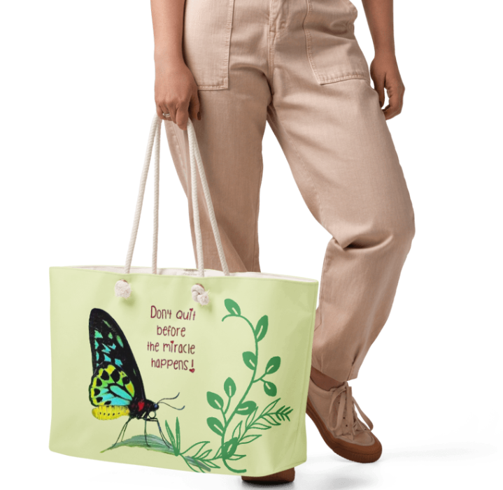 Don't Quit Weekender Tote Bag — Inspirational Art Tote Bag Featuring a Beautiful Butterfly and the Words Don't Quit Before the Miracle Happens on Soft Yellow Green for Women Who Are Still in the Fight